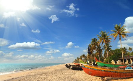 old fishing boats on beach in india