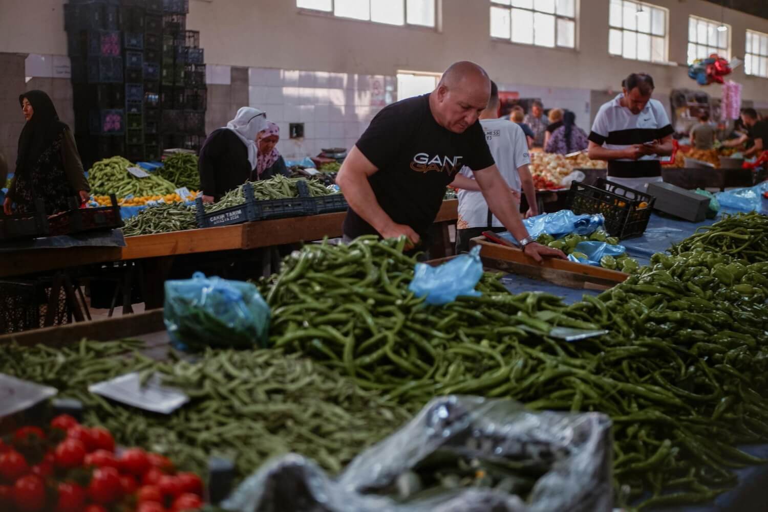 bustling indoor market with fresh produce